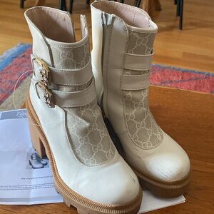 Gucci Women's Cream Ankle Boots with Logo Detail 35.5  is size . Made in Italy